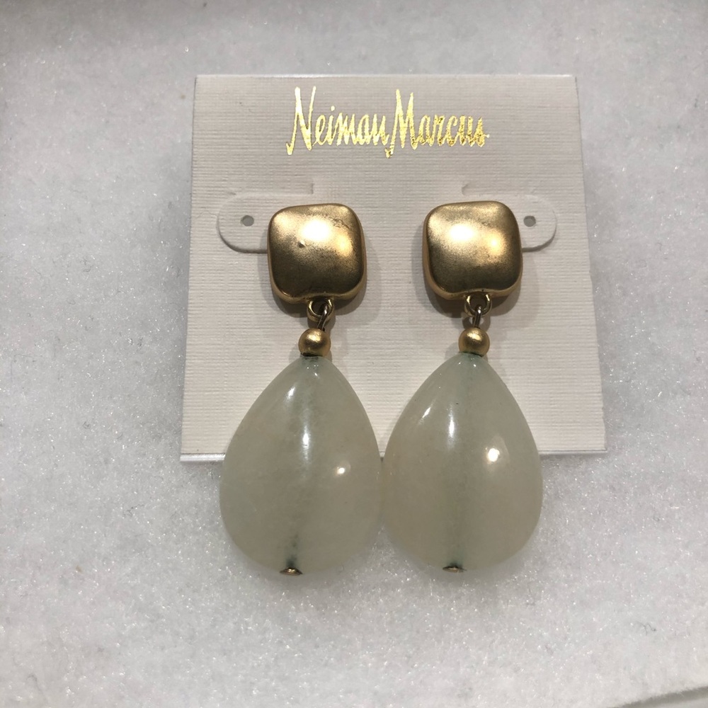 Gold drop earrings with pale green crystal drop.